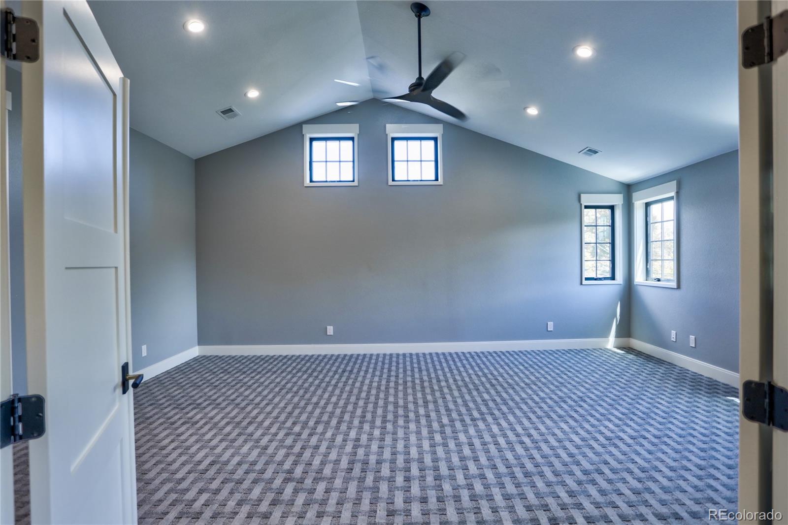 2732 South Jackson Street Denver, CO 80210 - Photo 24 of 40 a view of an empty room with a window