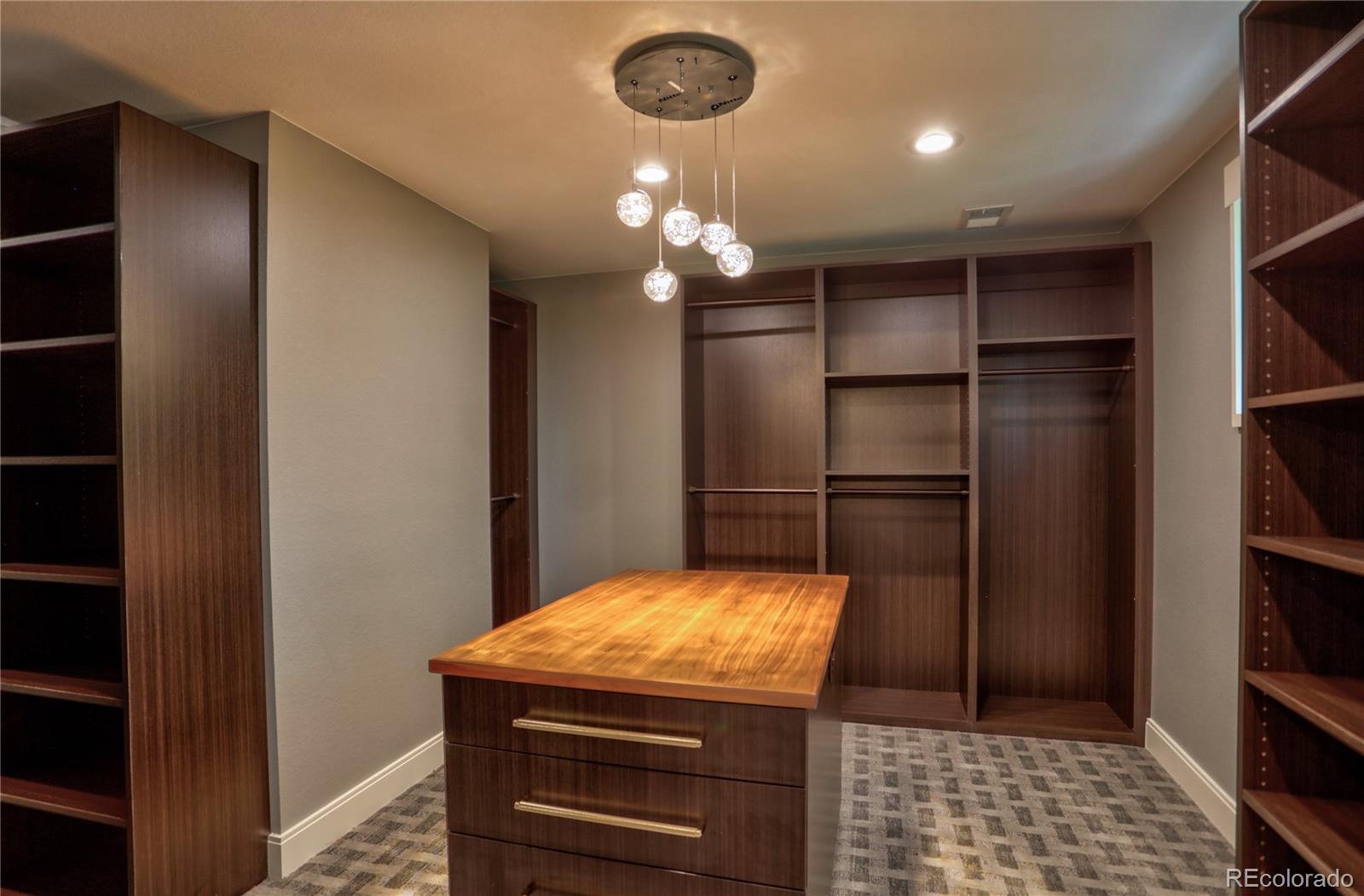 2732 South Jackson Street Denver, CO 80210 - Photo 28 of 40 a kitchen with stainless steel appliances granite countertop a refrigerator and a cabinets
