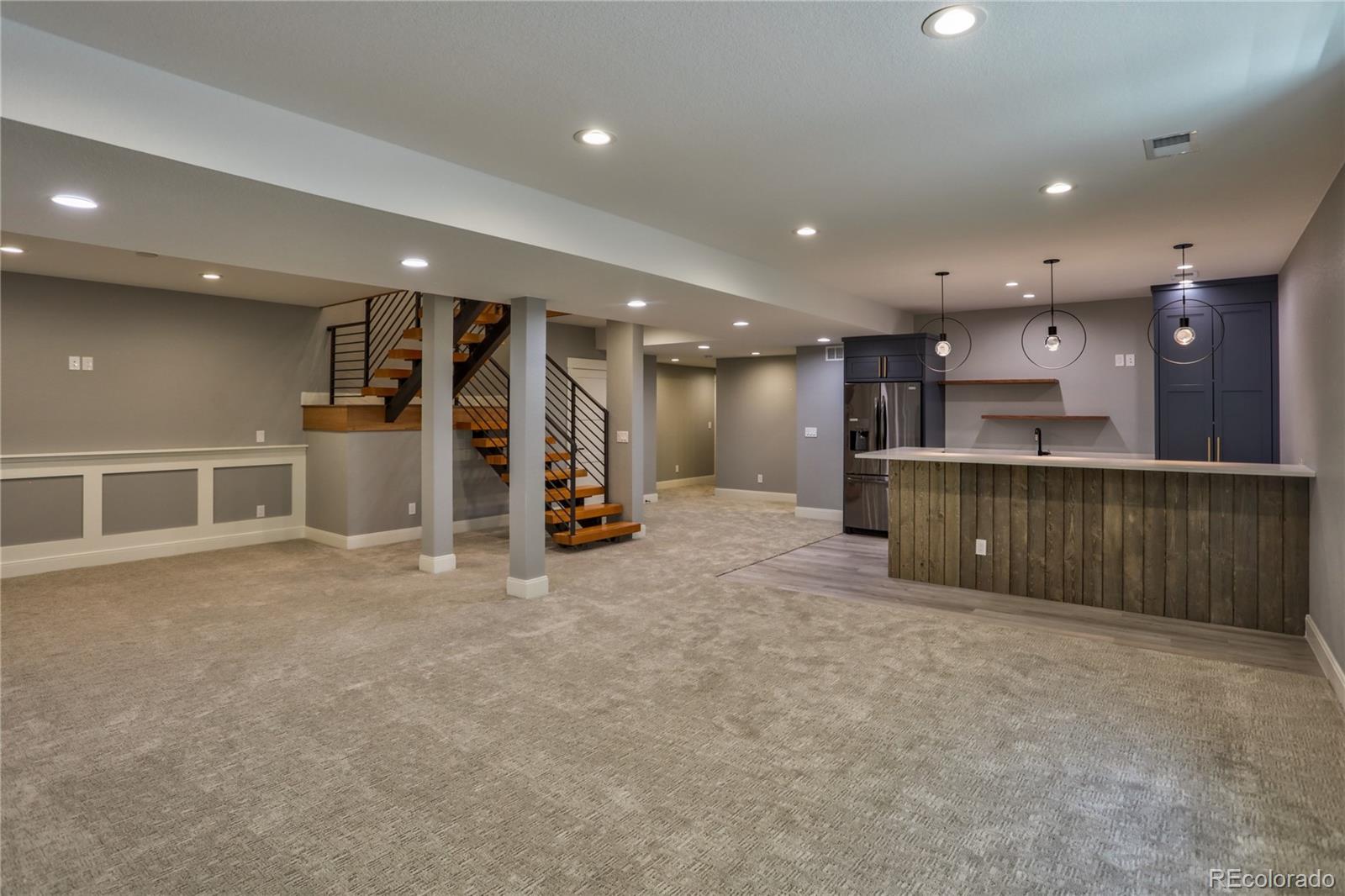 2732 South Jackson Street Denver, CO 80210 - Photo 38 of 40 a view of a big room with wooden cabinets