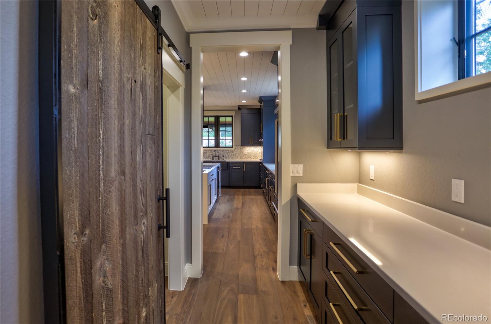 2732 South Jackson Street Denver, CO 80210 - Photo 8 of 40 a view of a kitchen and utility room