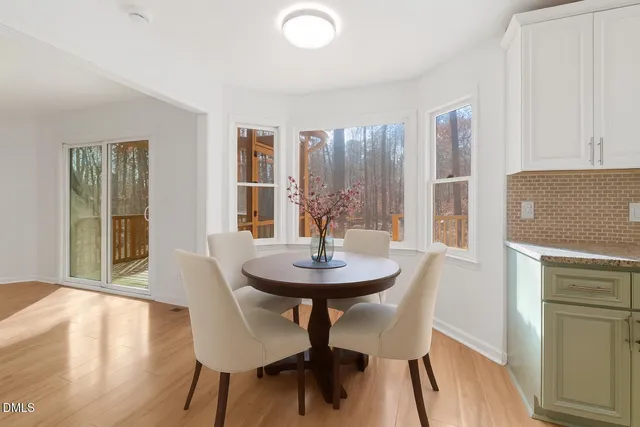 a kitchen with granite countertop a sink and cabinets