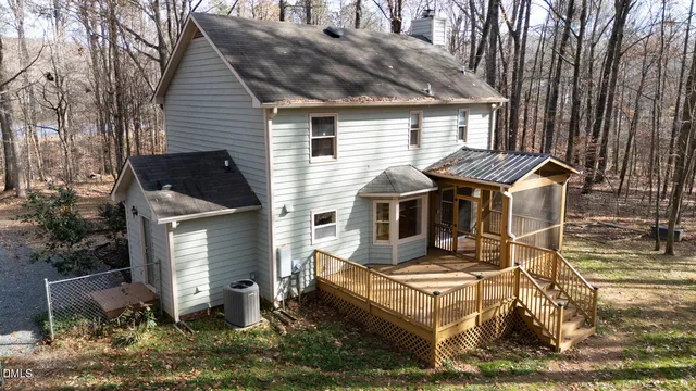 a view of a lake in middle of forest