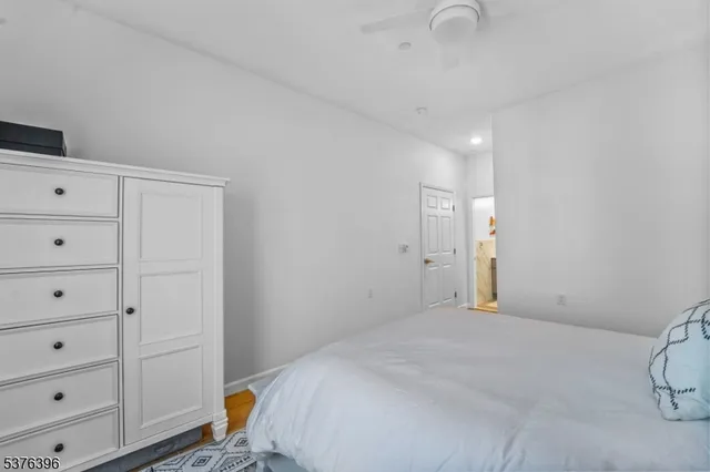 a view of a bedroom with cabinet