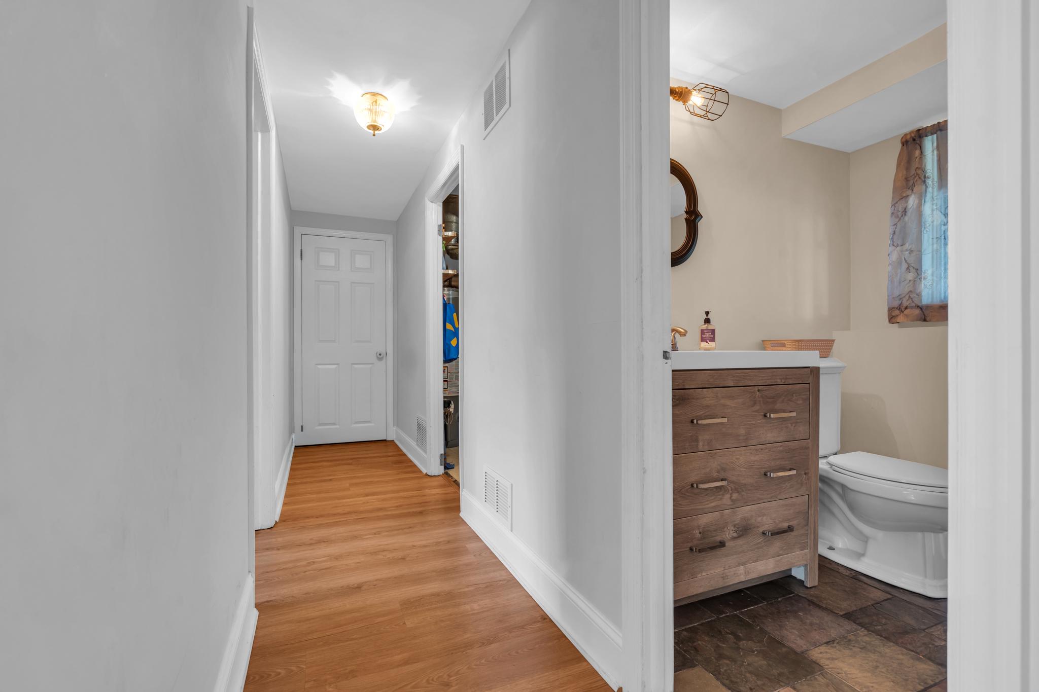34 Haines Mill Road Delran, NJ 08075 - Photo 23 of 34 Downstairs hallway to garage, bath and bonusrooms