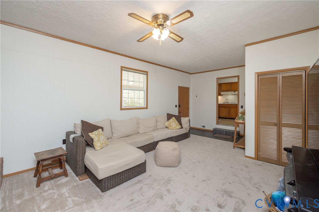 42 Maple Lane Blackstone, VA 23824 - Photo 13 of 35 a living room with furniture and a window