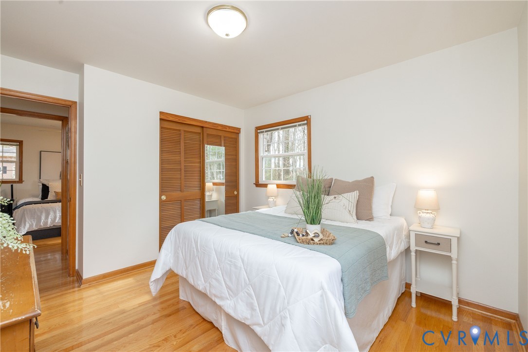 42 Maple Lane Blackstone, VA 23824 - Photo 21 of 35 a bedroom with a bed and wooden floor
