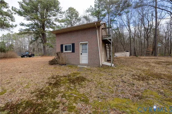 a house with trees in front of it