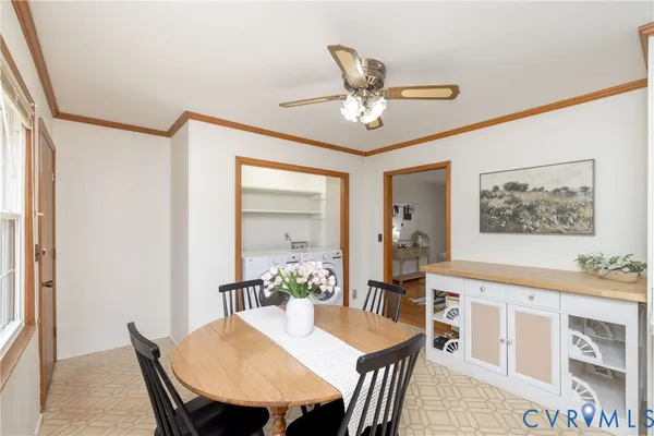 a view of a dining room with furniture