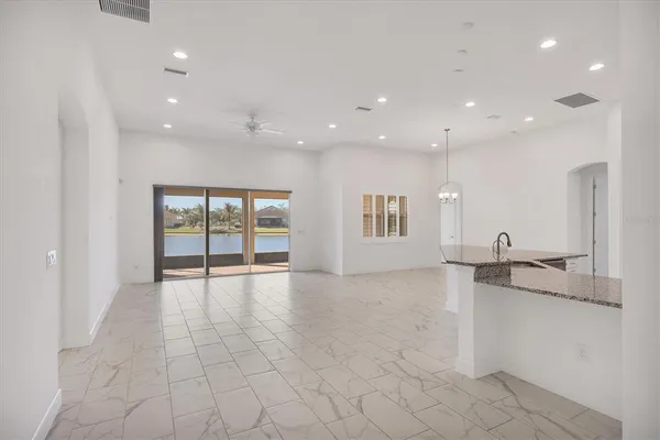 a view of an empty room with a sink
