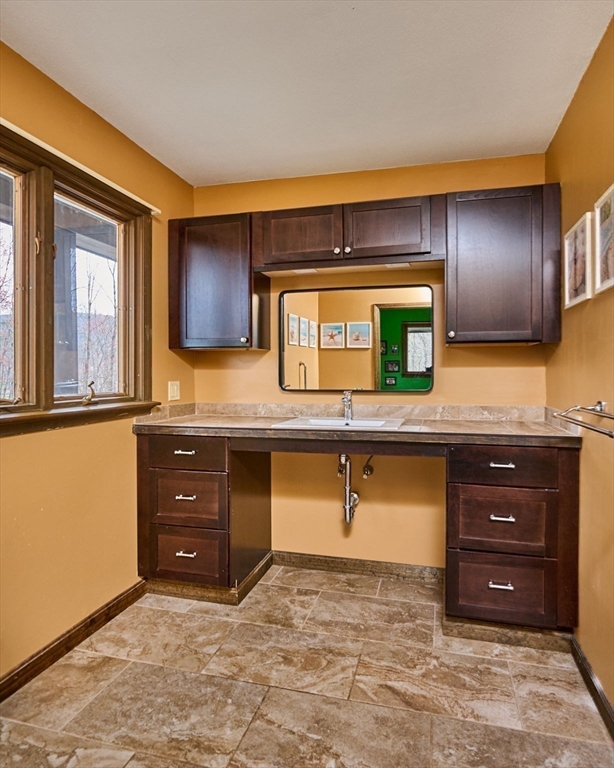 14 East Hawley Road Charlemont, MA 01339 - Photo 19 of 42 a room with a cabinets and a dresser