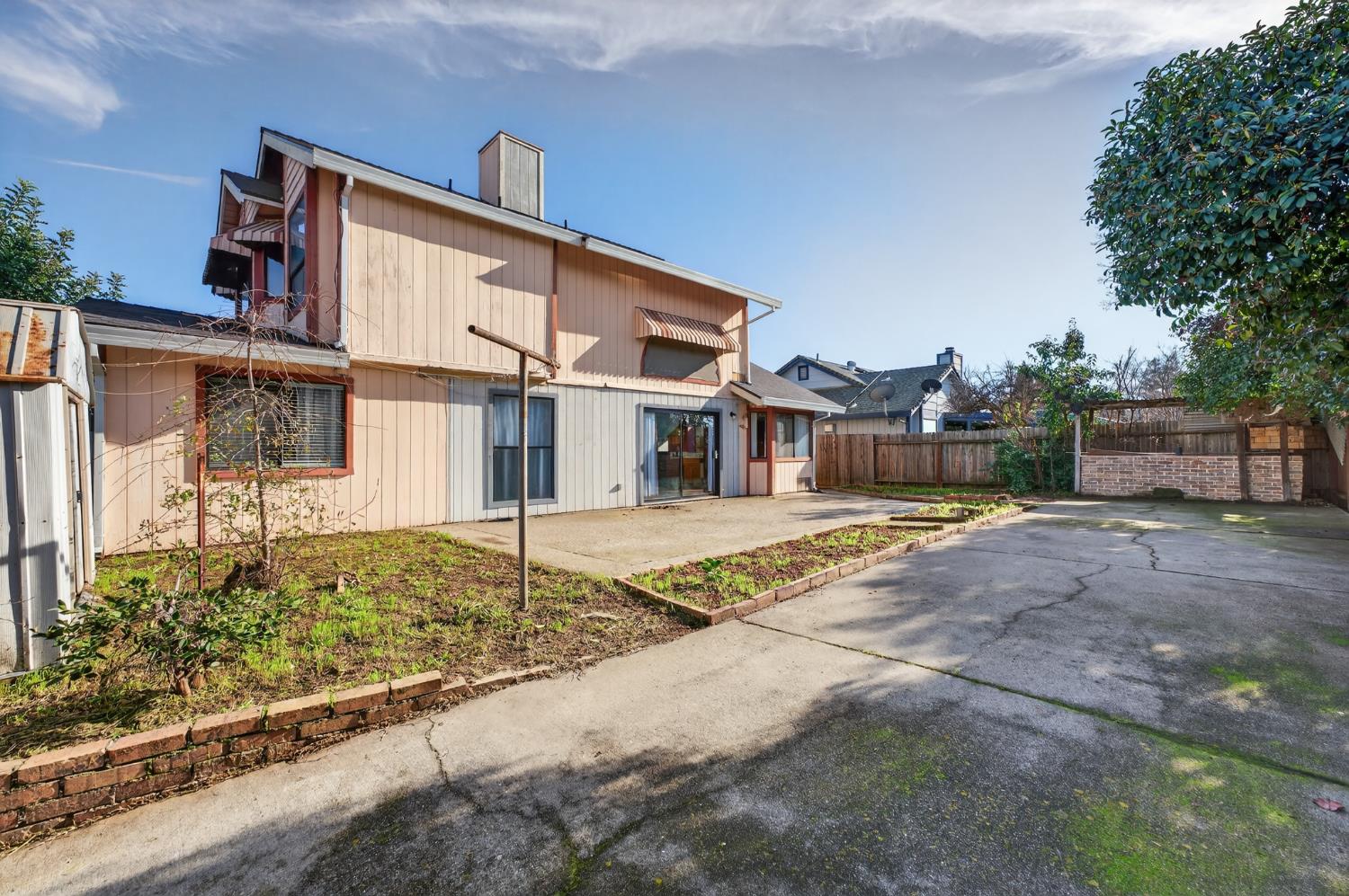 622 Q Street Lincoln, CA 95648 - Photo 24 of 25 a front view of a house with a yard and garage