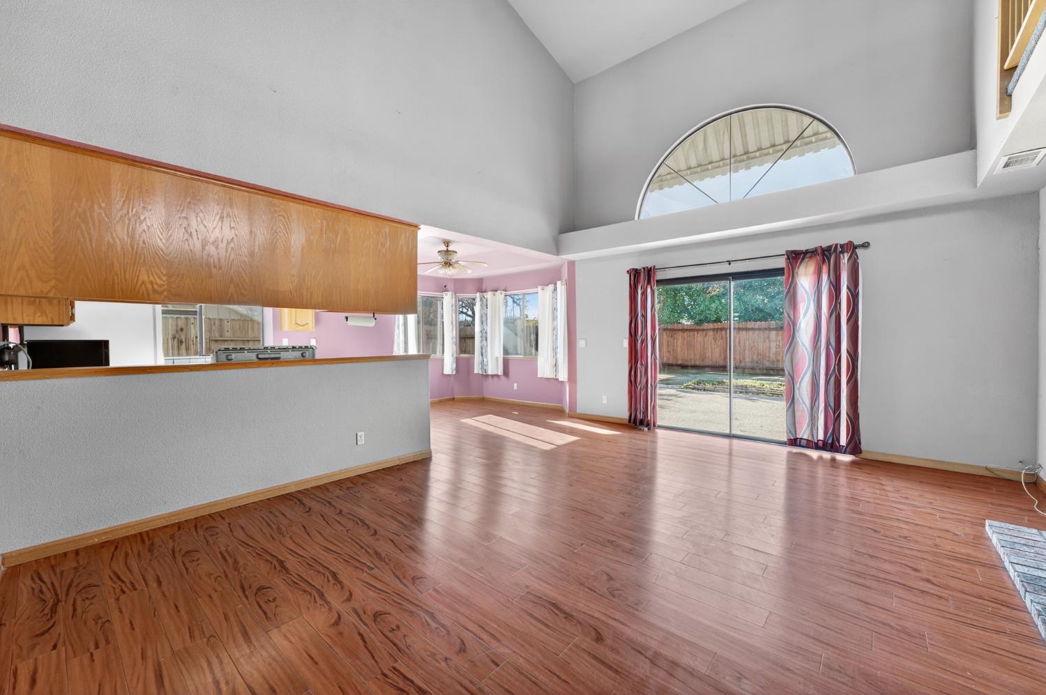 622 Q Street Lincoln, CA 95648 - Photo 3 of 25 a view of empty room with wooden floor and fan