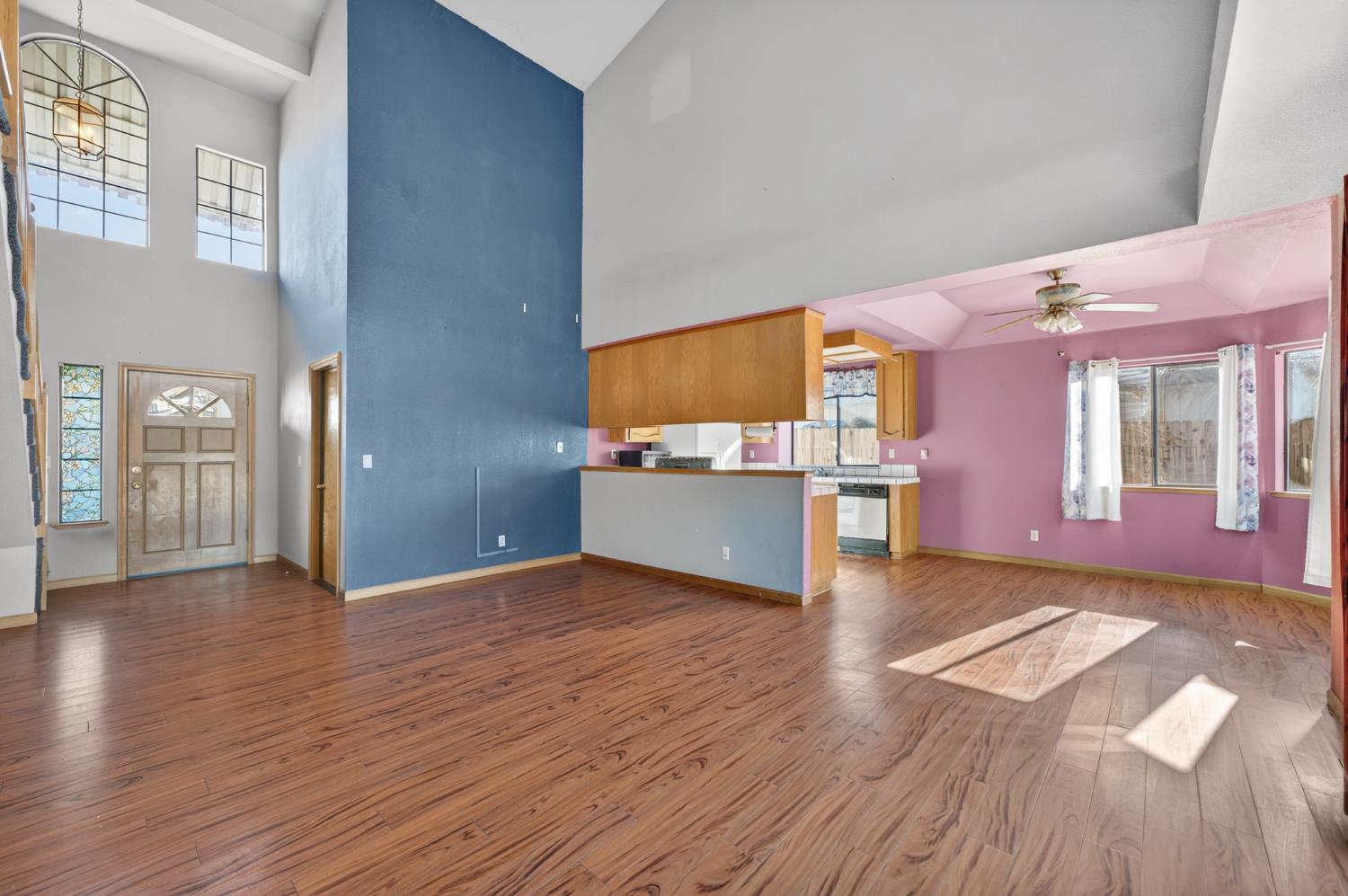 622 Q Street Lincoln, CA 95648 - Photo 6 of 25 a view of a livingroom with wooden floor and windows