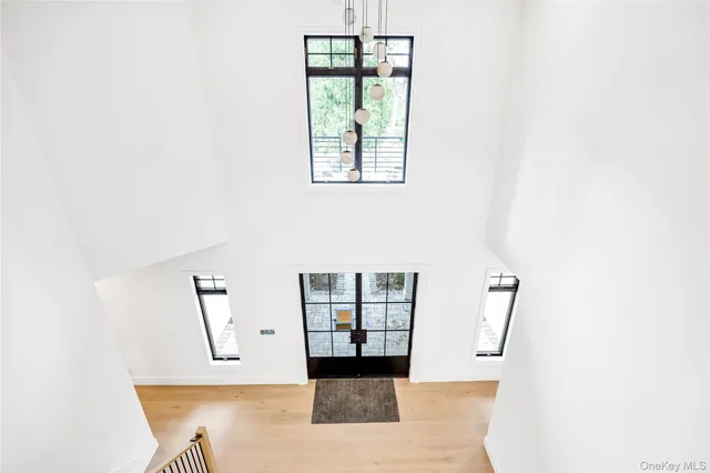 a view of entryway and hall with a window
