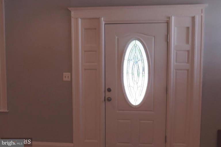3819 Barrington Road Baltimore, MD 21215 - Photo 2 of 19 with view of entryway with washer and dryer