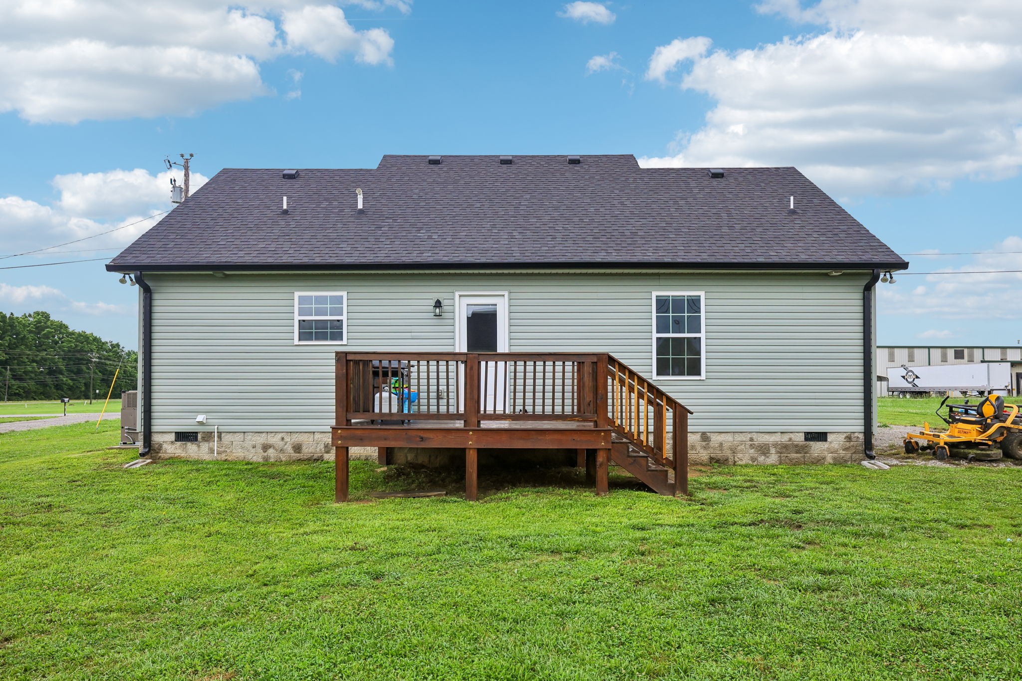 1715 Old Belfast Road Lewisburg, TN 37091 - Photo 39 of 42 a backyard of a house with wooden deck and furniture