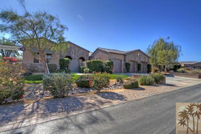 81129 Soaring Hawk Court Indio, CA 92201 - Photo 1 of 25 a view of a building with a yard