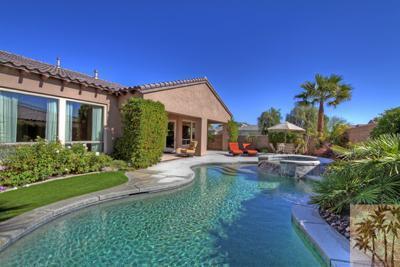 81129 Soaring Hawk Court Indio, CA 92201 - Photo 3 of 25 a front view of a house with garden