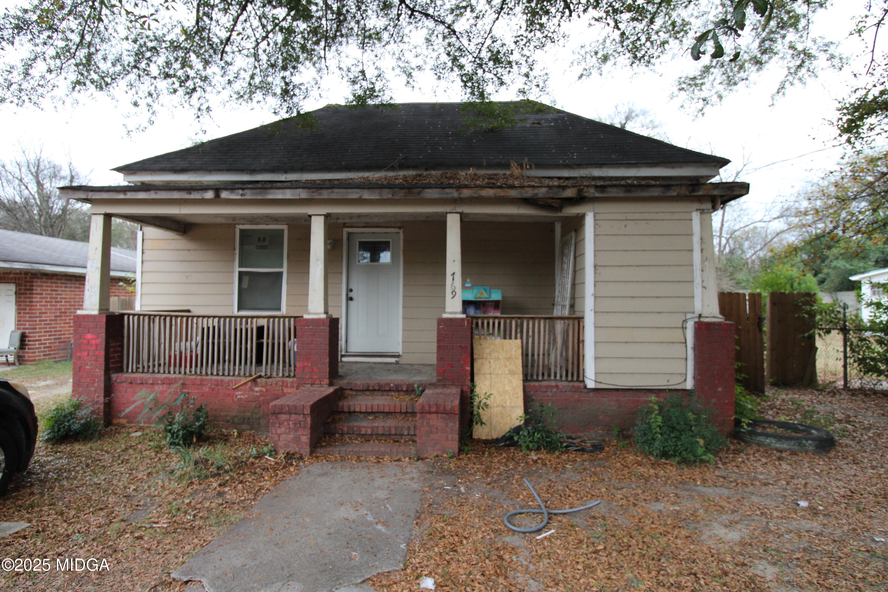 a front view of a house with garage