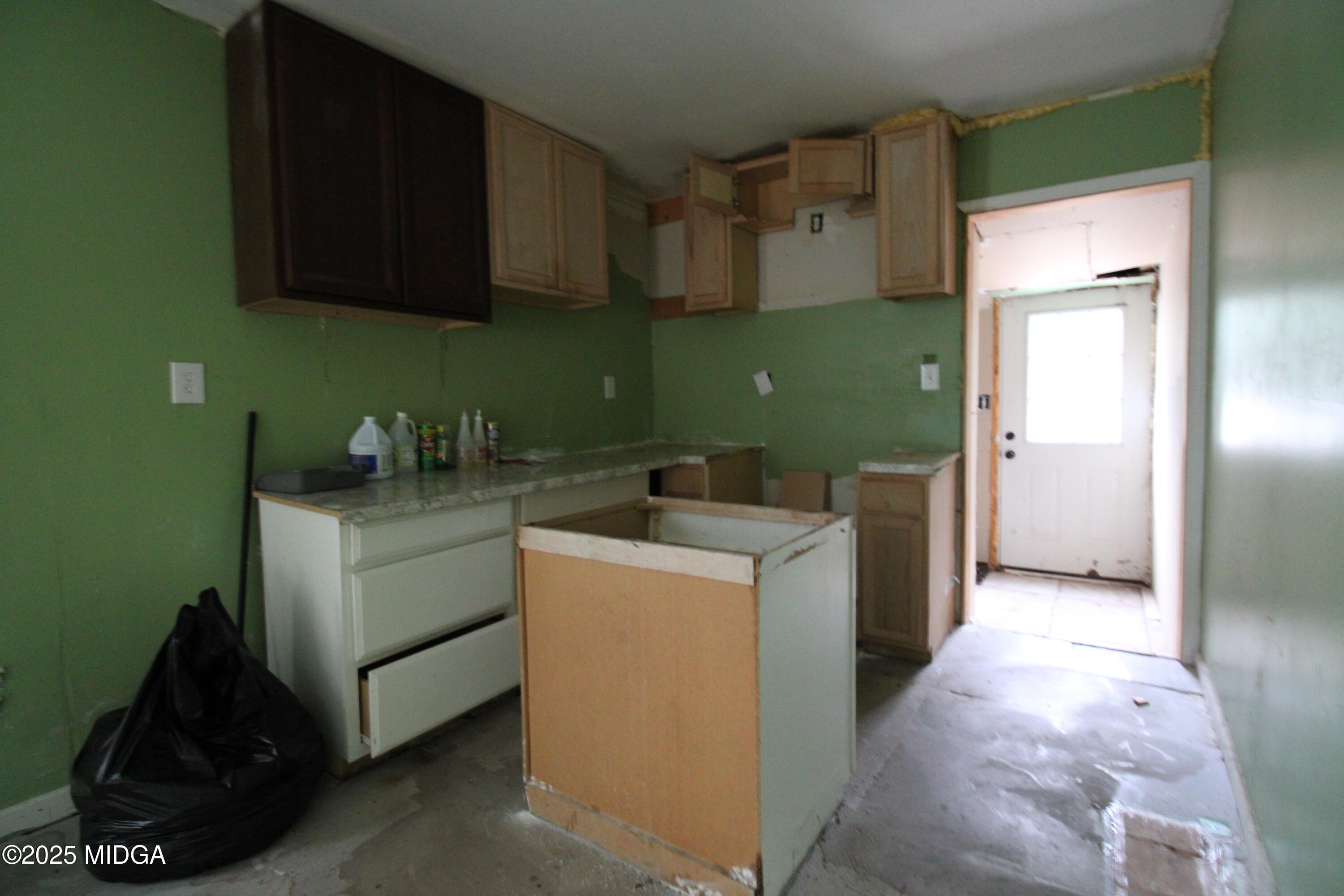 769 Bowman Street Macon, GA 31217 - Photo 4 of 12 a view of storage and utility room with washer and dryer