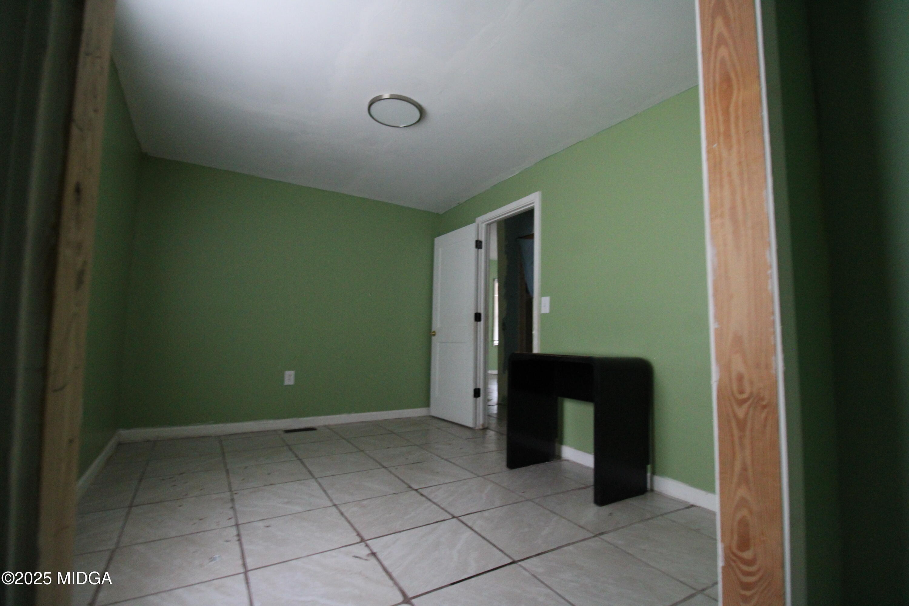 769 Bowman Street Macon, GA 31217 - Photo 8 of 12 a view of an empty room