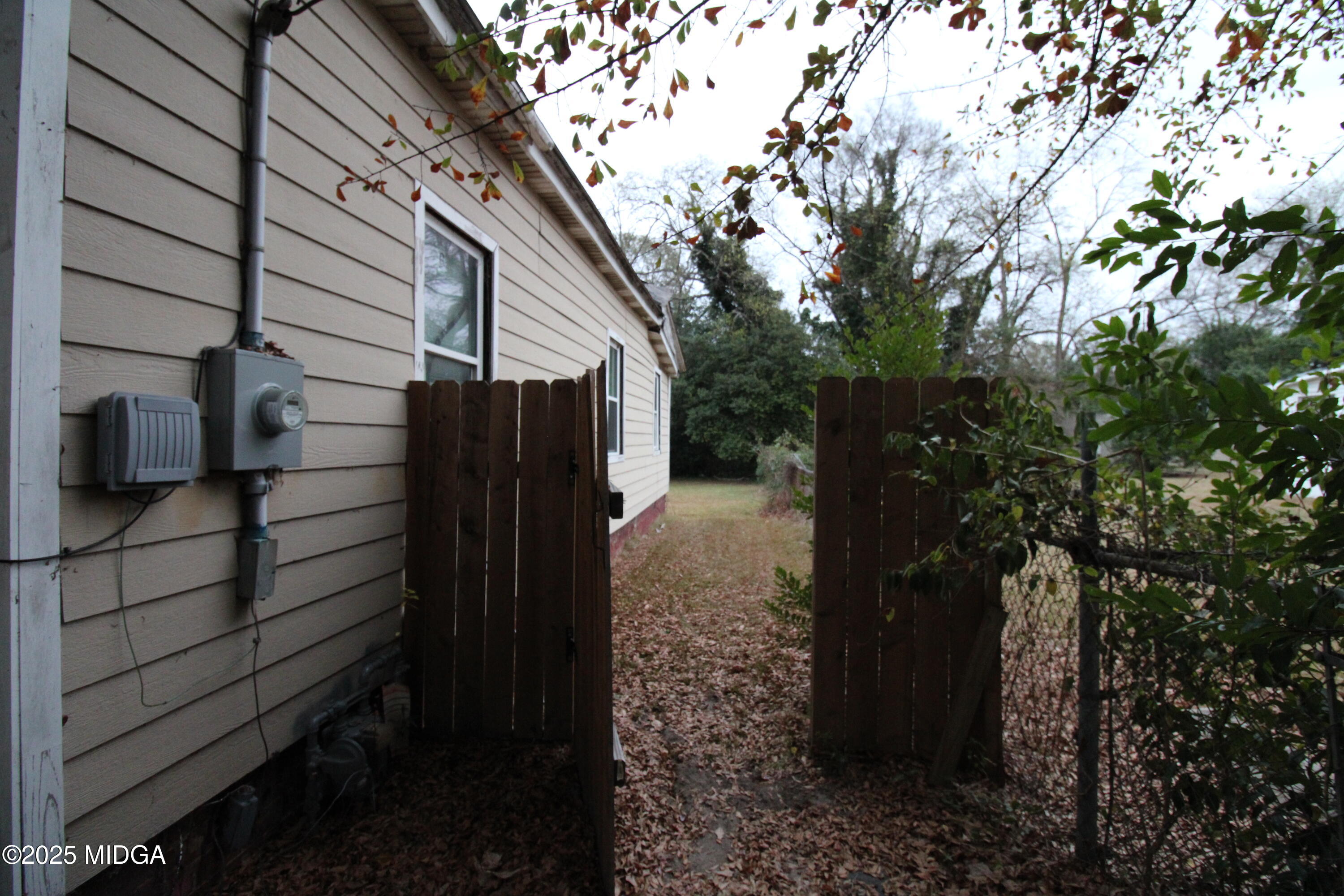 769 Bowman Street Macon, GA 31217 - Photo 9 of 12 a view of a house with a backyard
