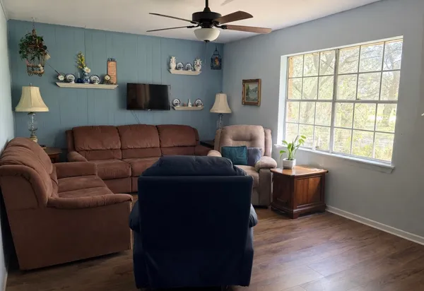 a living room with furniture and a window