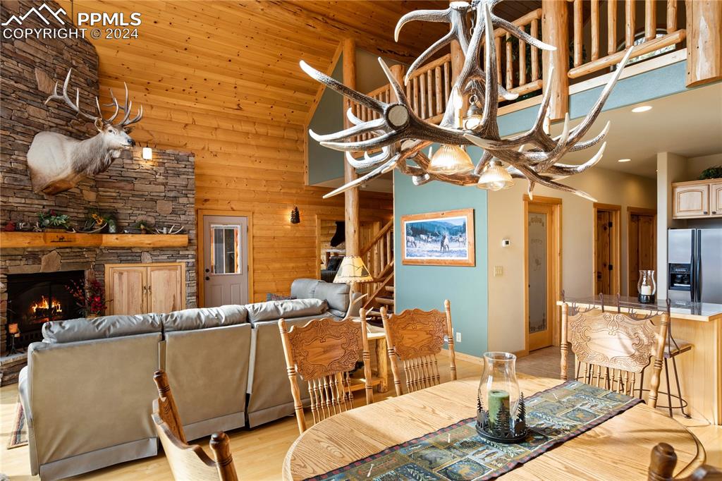 156 Paradiso Road Divide, CO 80814 - Photo 14 of 45 a view of a patio with dining table and chairs