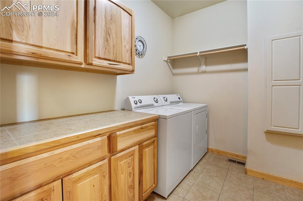 156 Paradiso Road Divide, CO 80814 - Photo 25 of 45 a utility room with dryer and washer