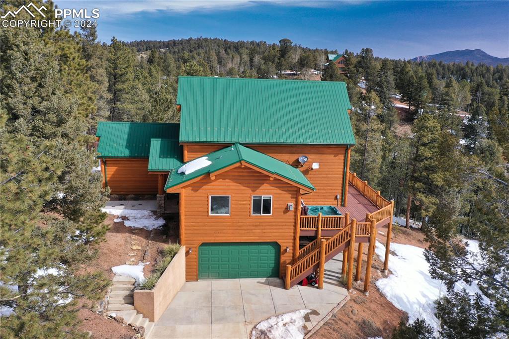 156 Paradiso Road Divide, CO 80814 - Photo 4 of 45 an aerial view of a house with a yard