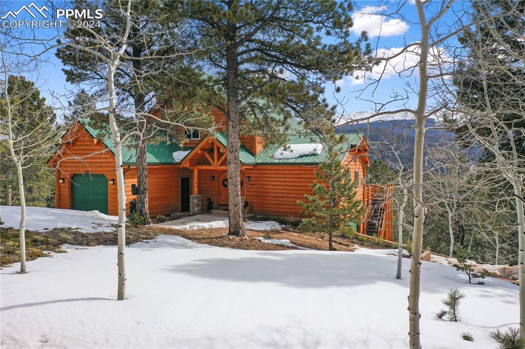156 Paradiso Road Divide, CO 80814 - Photo 5 of 45 a front view of a house with street