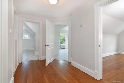 a view of entryway with wooden floor