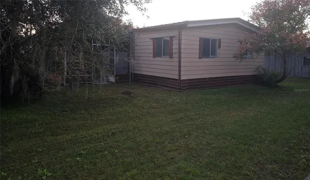 a view of house with wooden floor and a sink