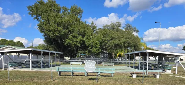 a view of a lake with a yard