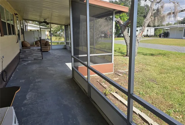 a view of living room with balcony