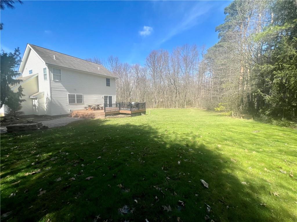 112 Old Forge Road Slippery Rock, PA 16057 - Photo 3 of 30 a backyard of a house with table and chairs