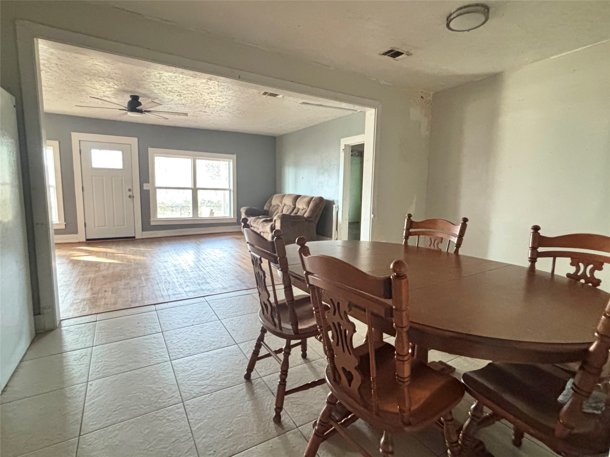 408 West Elder Street Colmesneil, TX 75938 - Photo 13 of 28 a view of a dining room with furniture and window