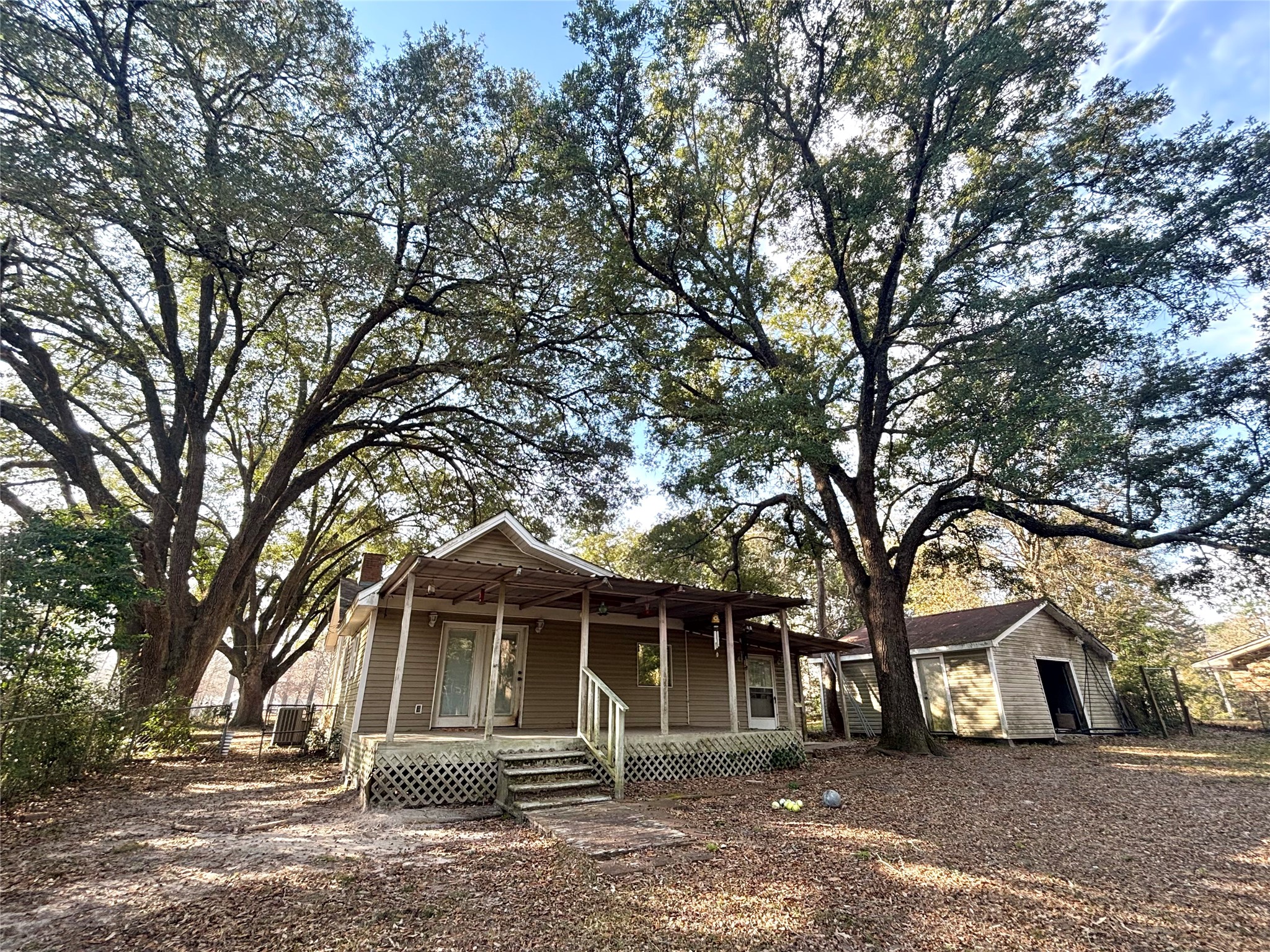 408 West Elder Street Colmesneil, TX 75938 - Photo 28 of 28 a front view of a house with a tree