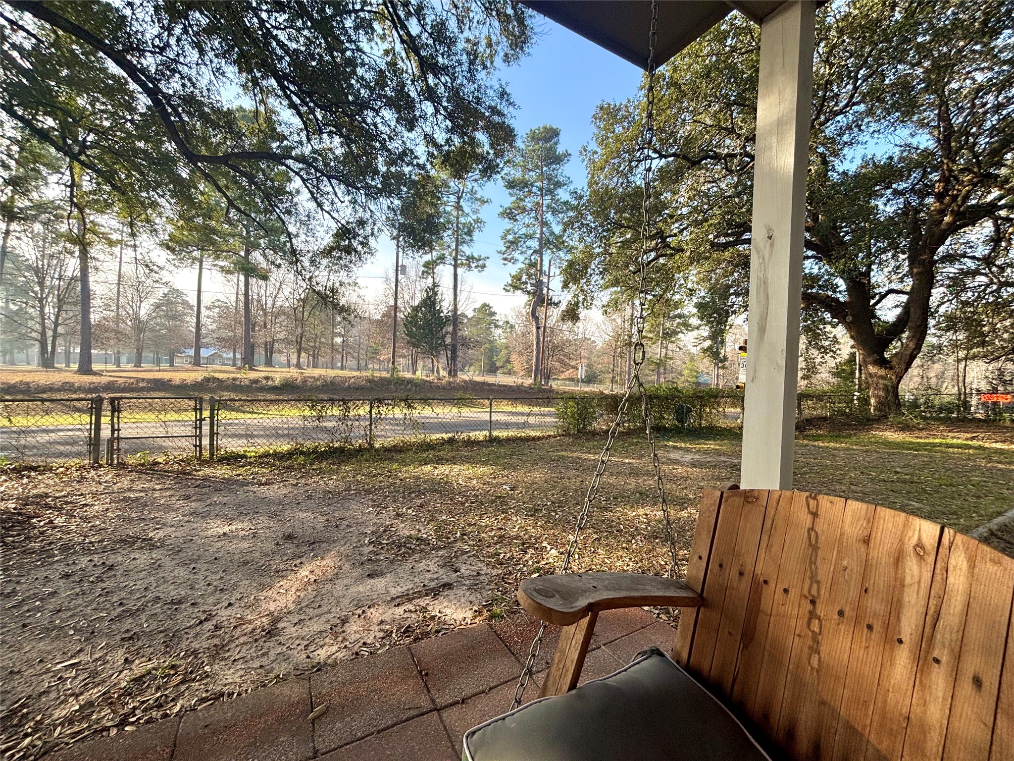 408 West Elder Street Colmesneil, TX 75938 - Photo 9 of 28 a view of a yard with plants and trees