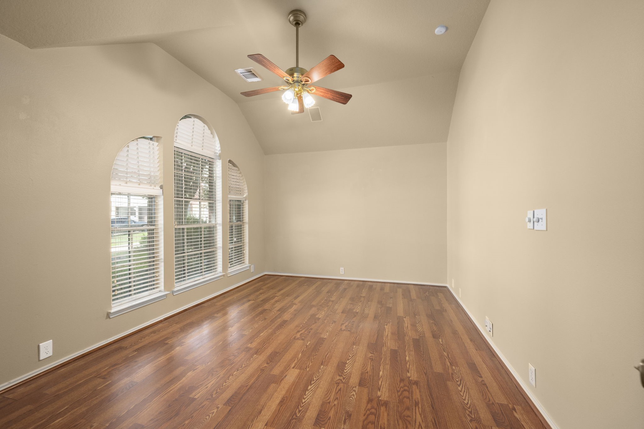 2007 Louetta Spring Drive Spring, TX 77388 - Photo 9 of 50 Need a quiet place to work from home? The private study offers vaulted ceilings, large windows, and plenty of room for a full executive office or flex space.