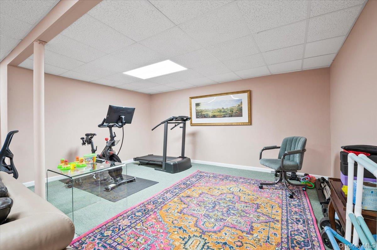 12 Ridge Court Glen Head, NY 11545 - Photo 30 of 46 Exercise area with carpet and a drop ceiling