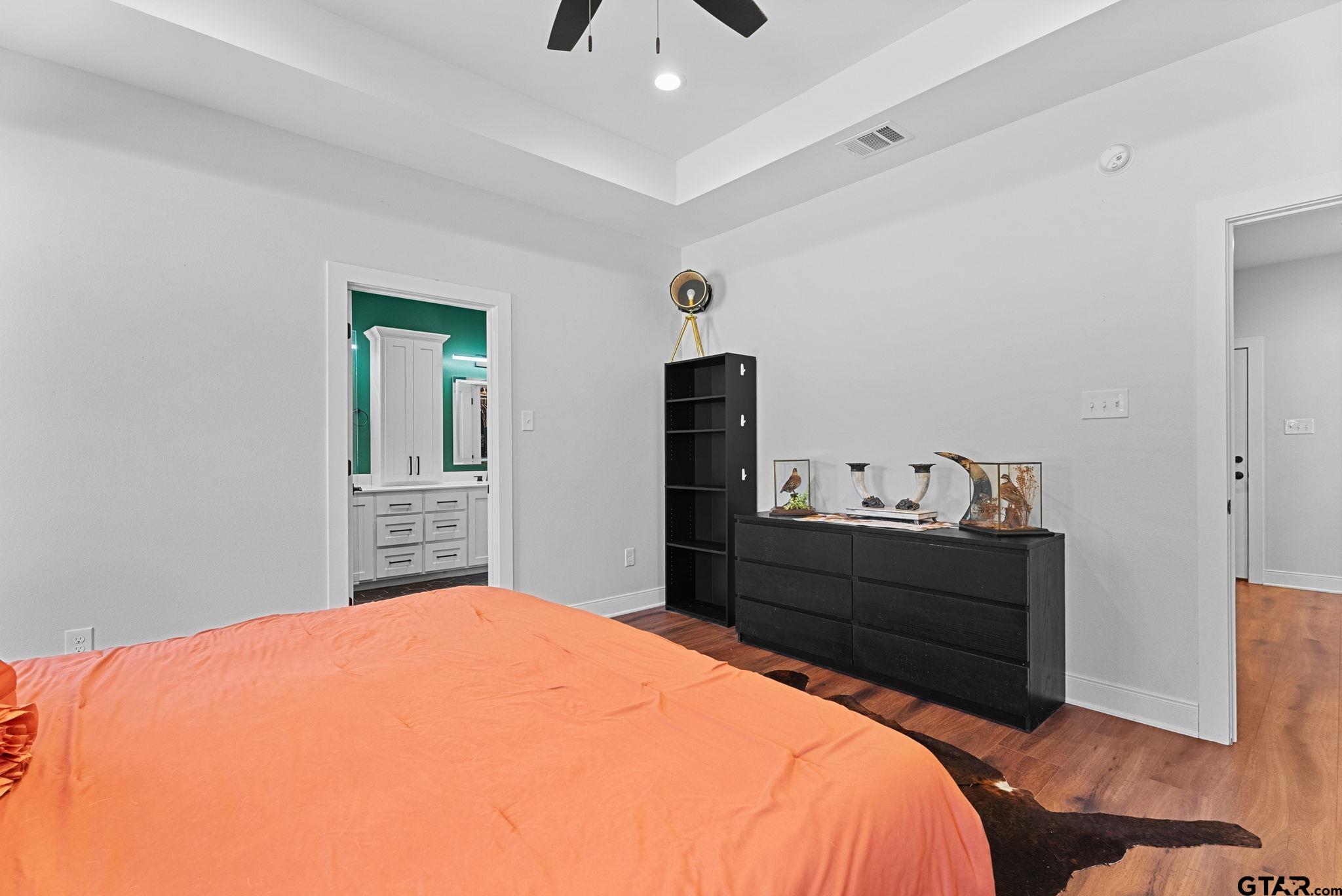 10374 Highway 204 Cushing, TX 75760 - Photo 15 of 28 a bed room with a bed and a television