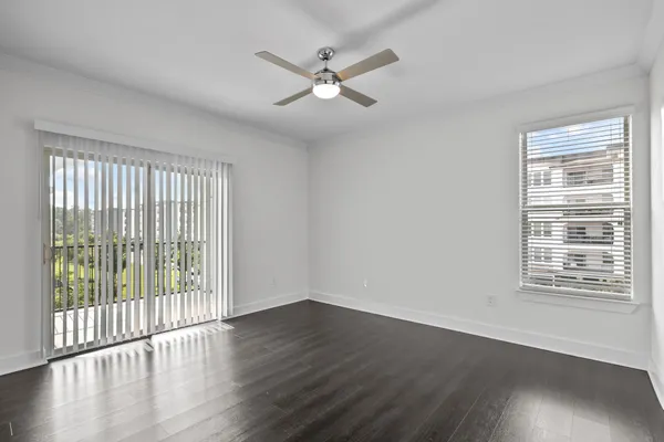 a bathroom with a double vanity sink a mirror and a bathtub