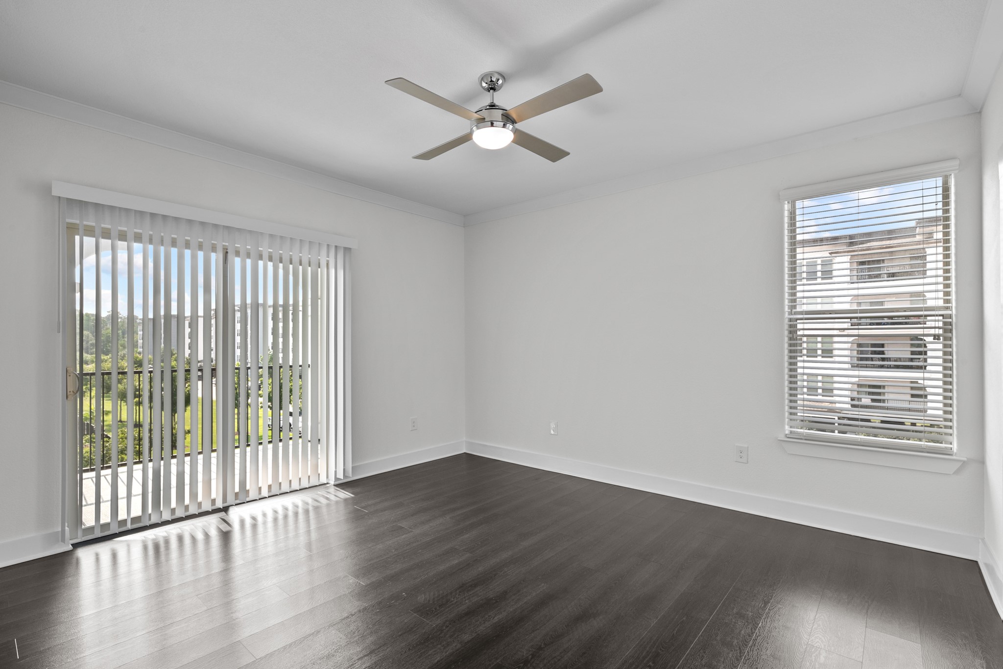 366 Fm 1488 Road, Unit 1249 Conroe, TX 77384 - Photo 11 of 25 a view of an empty room with wooden floor and a window