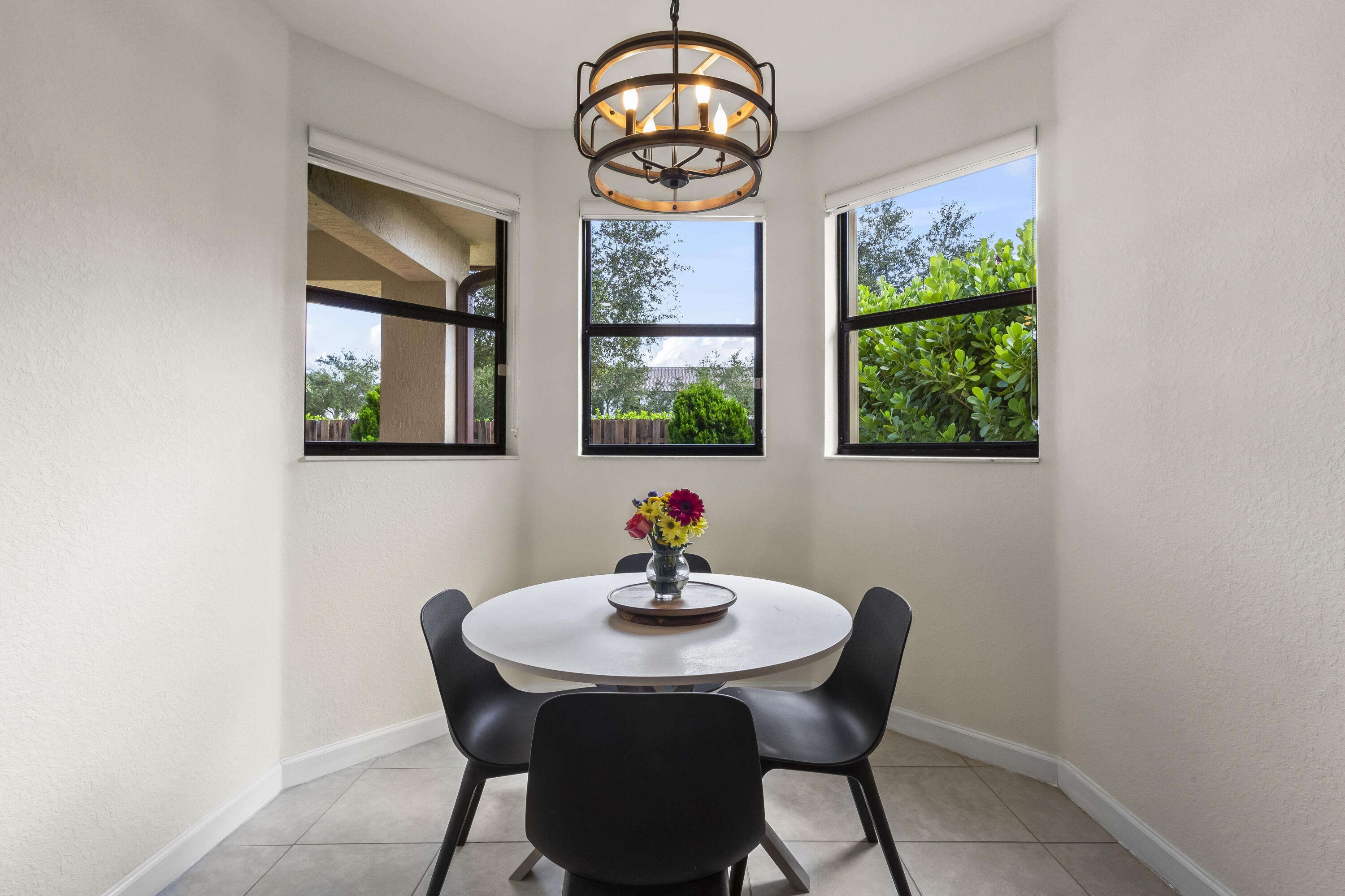 11823 Southwest 151st Place Miami, FL 33196 - Photo 20 of 53 a dining room with furniture and window