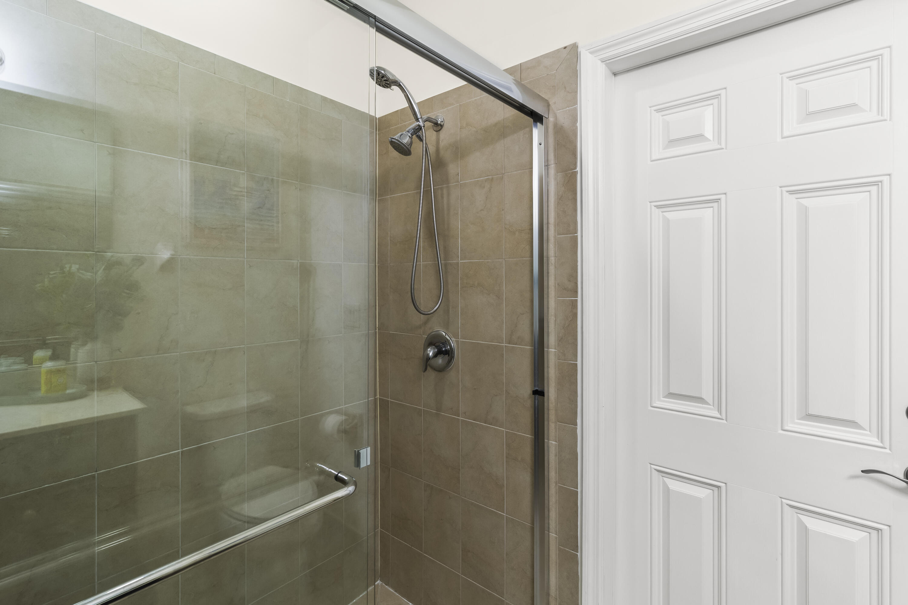 11823 Southwest 151st Place Miami, FL 33196 - Photo 24 of 53 a bathroom with a shower