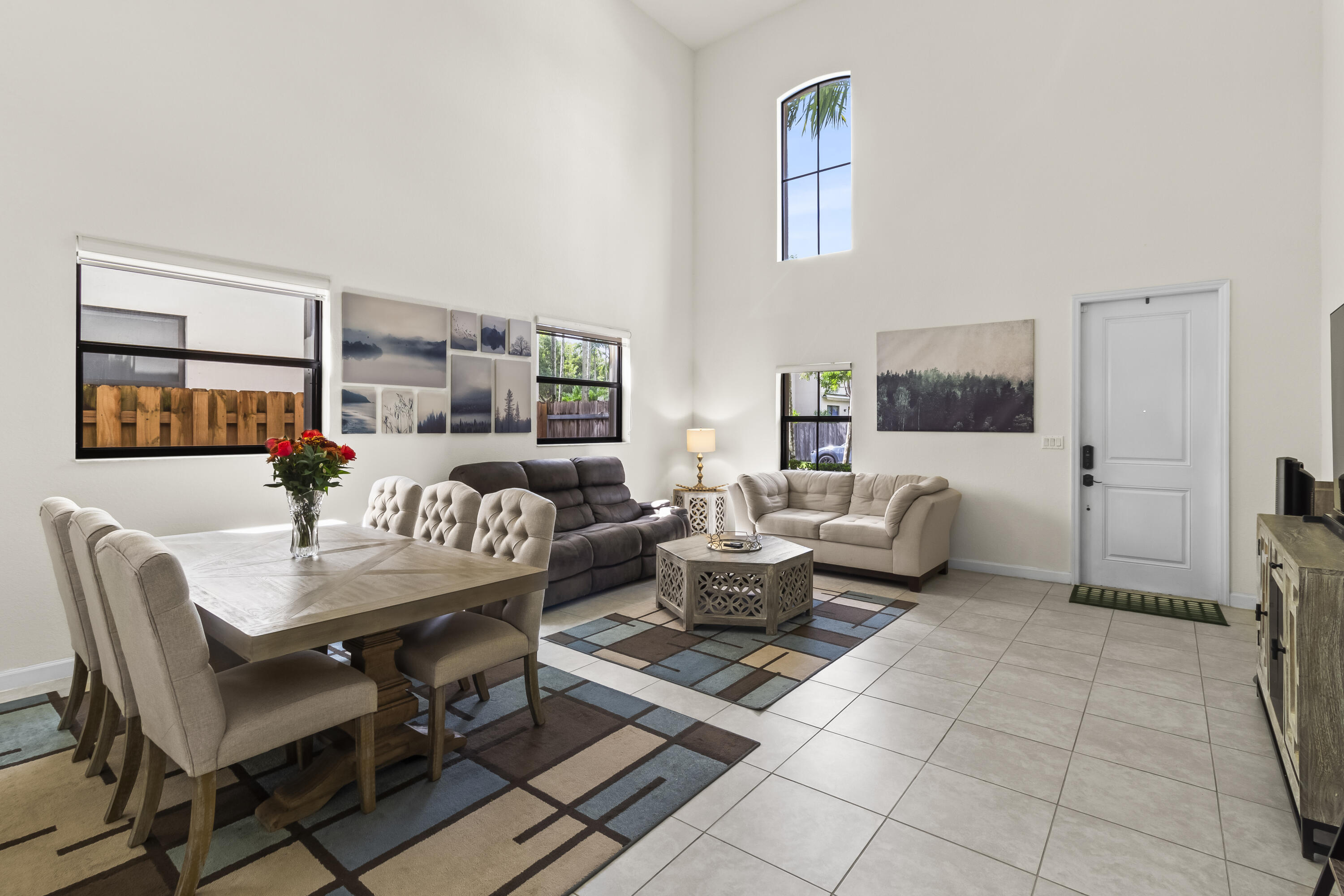 11823 Southwest 151st Place Miami, FL 33196 - Photo 10 of 53 a living room with furniture and a flat screen tv