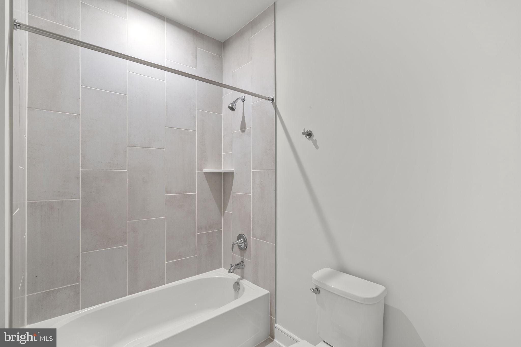 2611 Blue Rdg Avenue Marshall, VA 20115 - Photo 38 of 47 a bathroom with a shower a toilet and a bathtub
