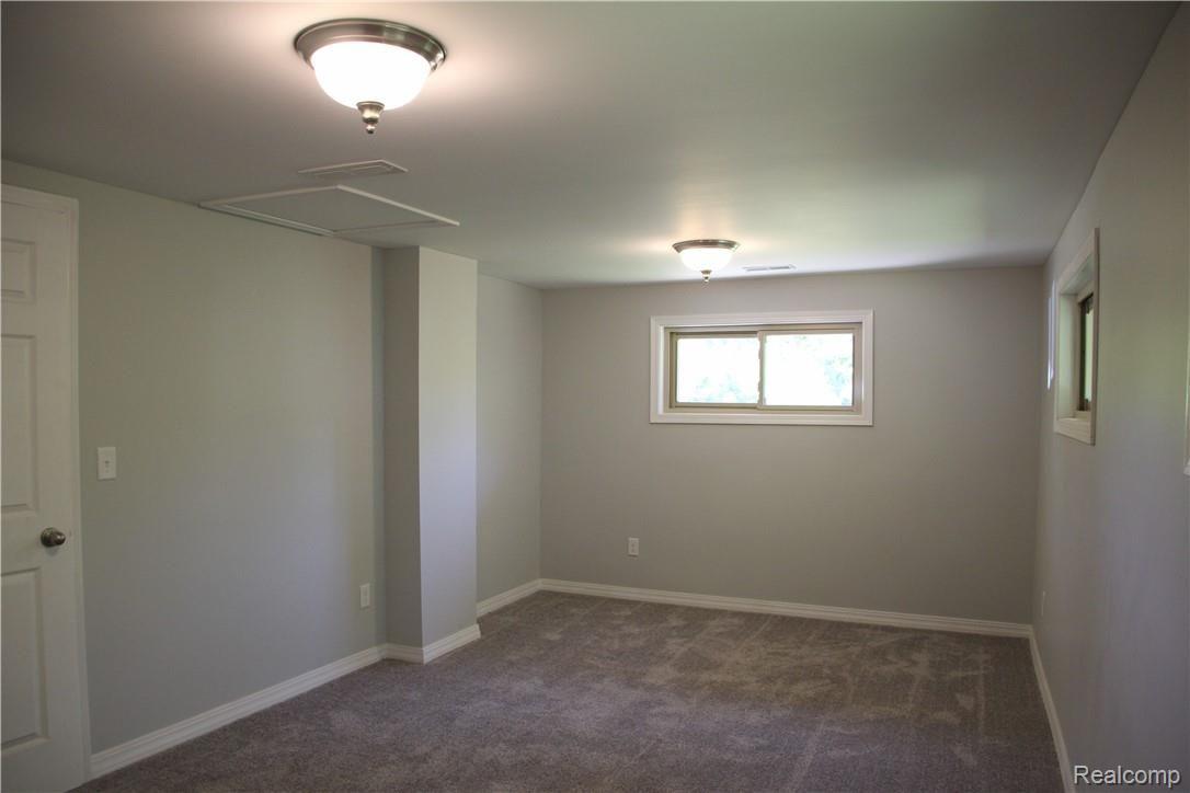 16017 Cavanaugh Lake Road Chelsea, MI 48118 - Photo 19 of 27 Family room