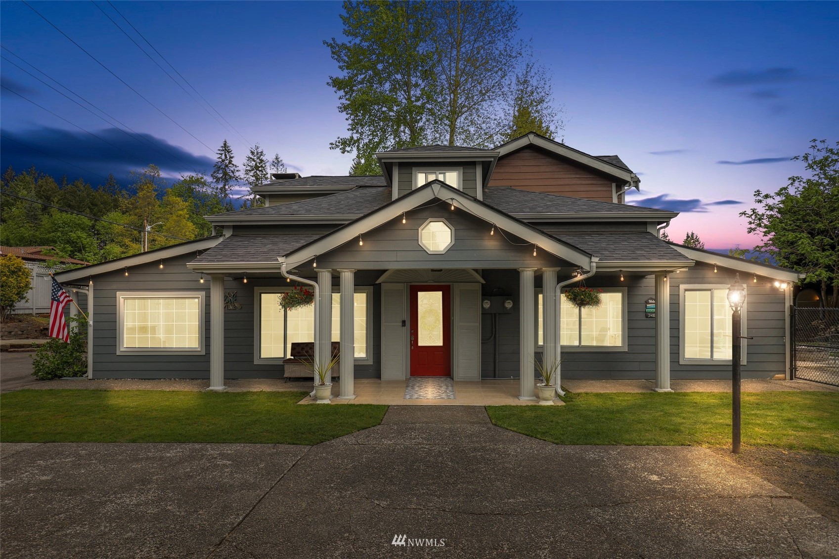 7031 Mullen Road Southeast Olympia, WA 98503 - Photo 1 of 40 a front view of a house with a yard and garage